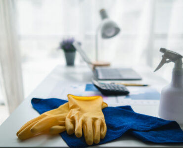Cleaning woman housewife wash up dishes after dinner in the kitc